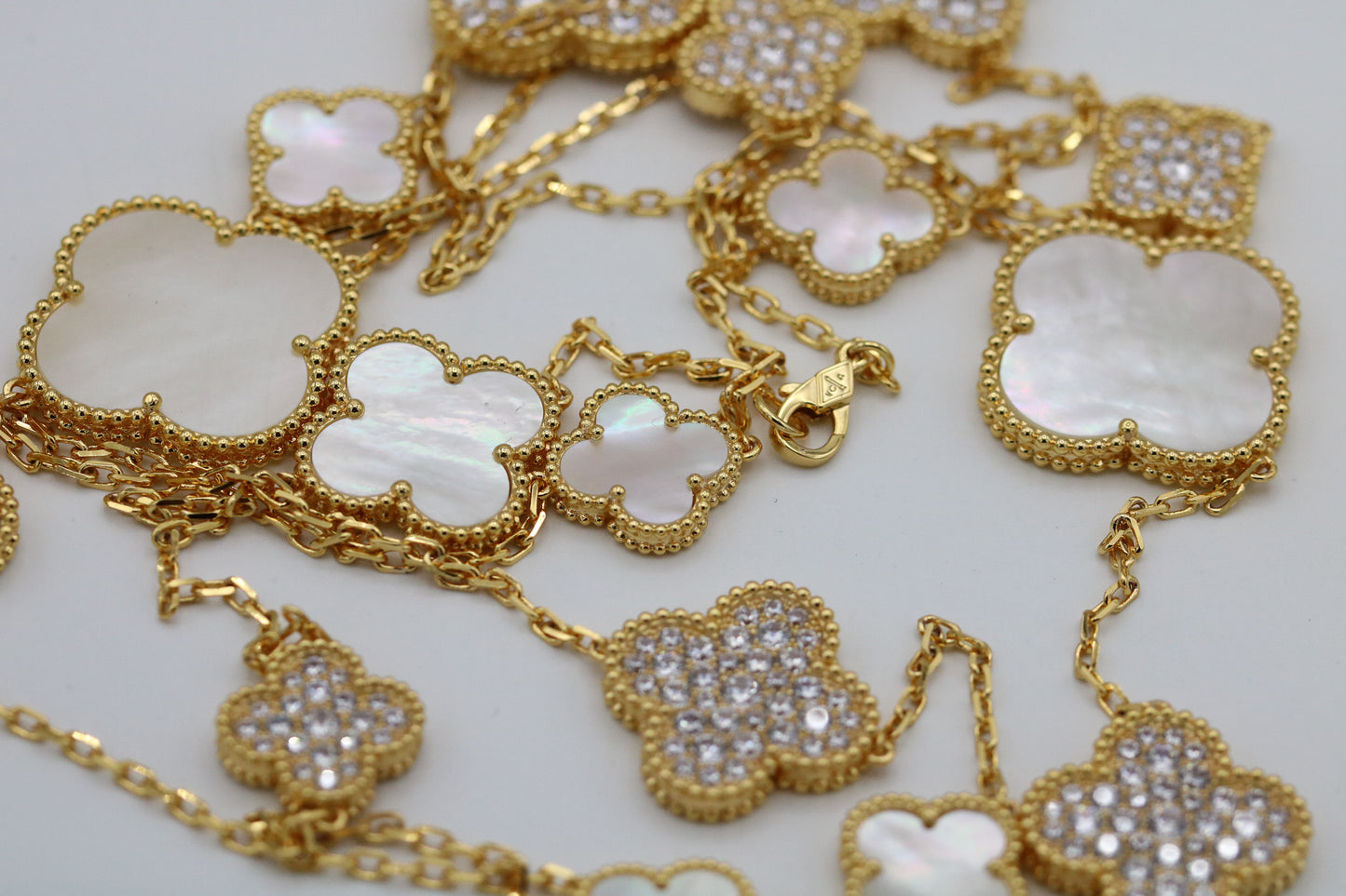 CZ & Mother of pearl 16 motif clover necklace 120 cm long 925 silver 18k gold plated